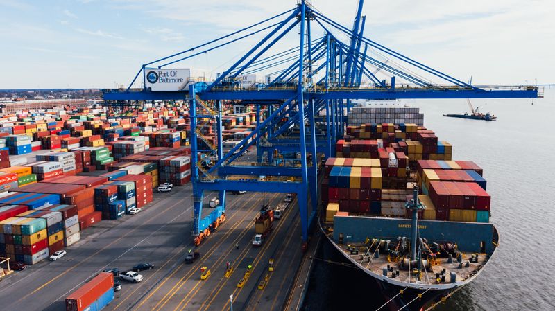 Cargo ship being supplied at port