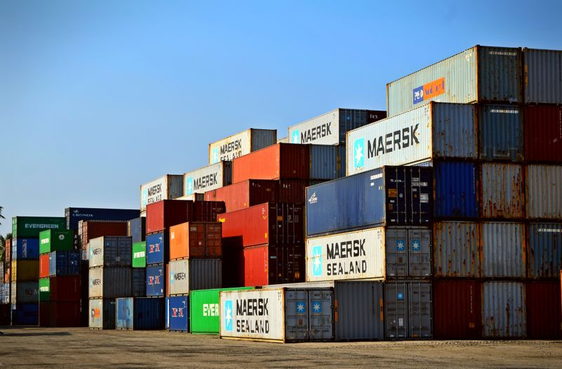 Shipping containers stacked at a trade terminal